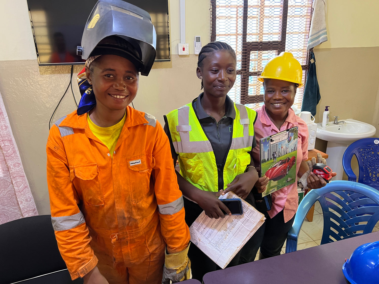 Marie, Hawa, and Success--three members of the construction team building a world-class maternal care center in Sierra Leone thanks to your support